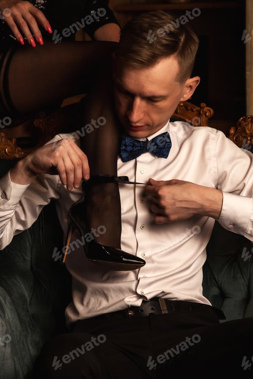 Preview: Sexy attractive couple intimacy foreplay in living room