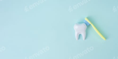 Preview: White tooth with a toothbrush