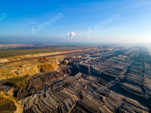 Preview: Mining equipment in a brown coal open pit mine near Garzweiler, Germany. Aerial View