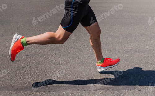 Preview: legs runner athlete running on marathon