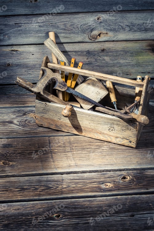 Preview: Old wooden carpenters tool box on old wooden table
