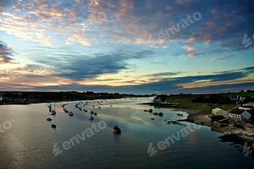 Preview: Sunset over boats river in Normandy, France