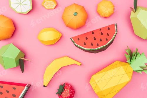 Preview: top view of handmade colorful origami fruits on pink