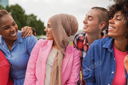 Preview: Young multiracial women having fun together in the city