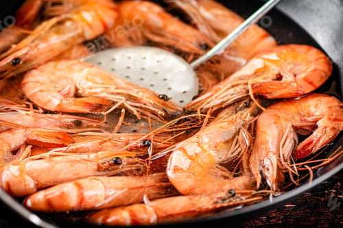 Preview: Cooking shrimp in water. Macro background.