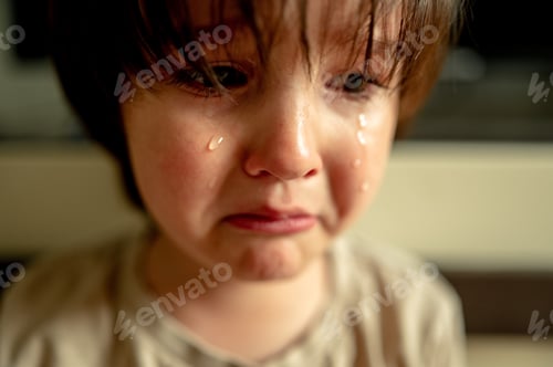 Preview: a little Asian boy is crying. The child was offended, he is sad and upset