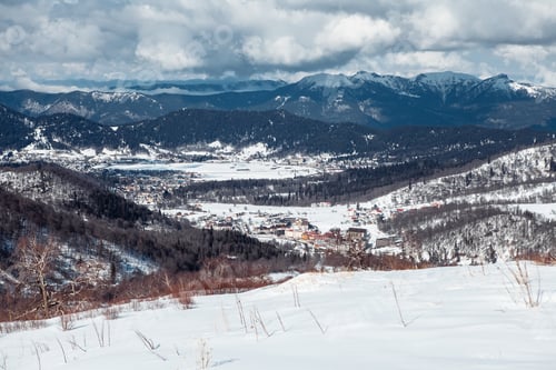 Preview: Caucasian mountains covered with snow on a sunny day