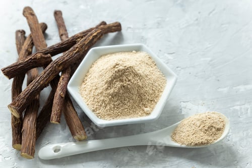 Preview: Powder and licorice root on the table - Glycyrrhiza glabra