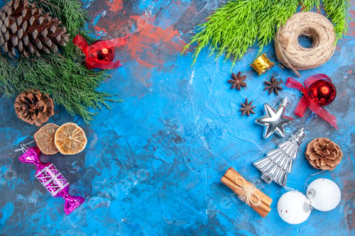 Preview: top view pine tree branches straw thread xmas tree toys anise seeds cinnamon sticks dried lemon