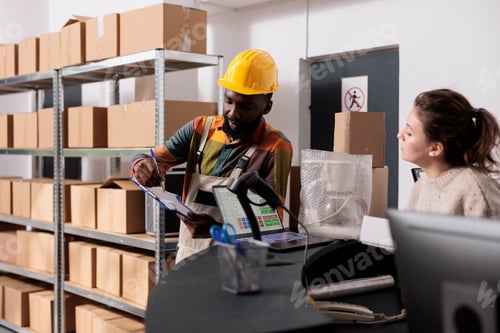 Preview: African american employee looking at merchandise report