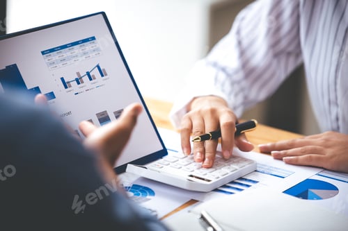 Preview: Team work with business analytic price chart on the table at the conference room.