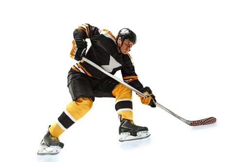 Preview: one caucasian man hockey player in studio silhouette isolated on white background