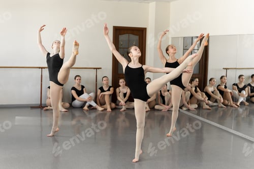 Preview: Young girls dancing ballet in studio. Classical dance school