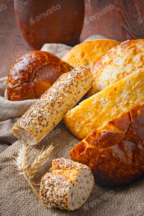 Preview: Displayed variety of whole breads.
