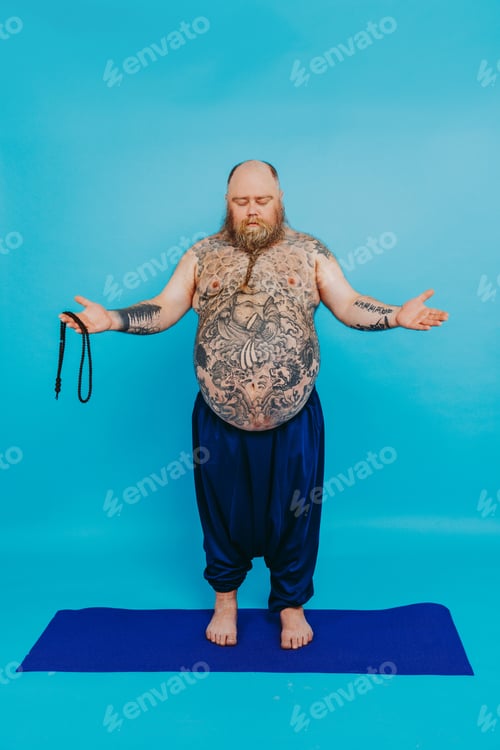 Preview: Funny fat man doing yoga meditation