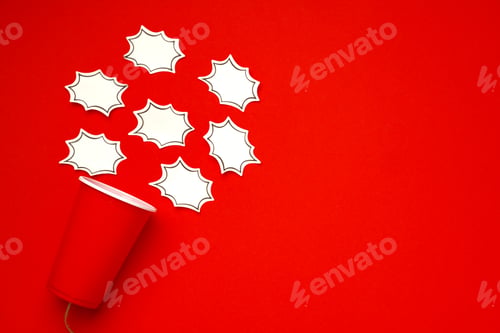 Preview: Toy telephone made of plastic cup and string on red background with speech bubble