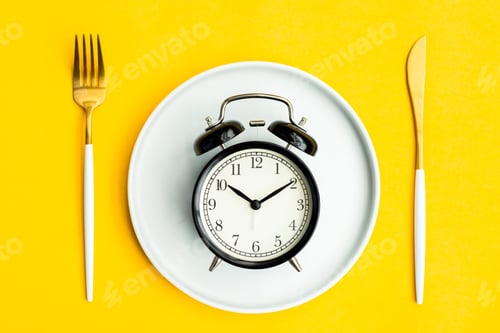 Preview: Minimal macro photography of white plate with fork and knife on yellow background