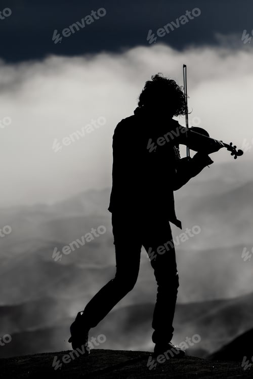 Preview: violinist silhouette on the volcano