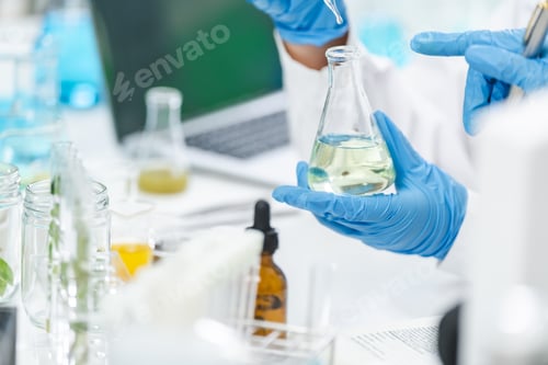 Preview: researcher working in laboratory for medicals science research using scientific equipment technology