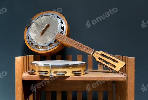 Preview: Old wooden banjo and tambourine