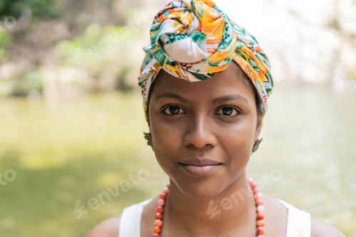 Preview: Portrait of a young African girl outdoors.