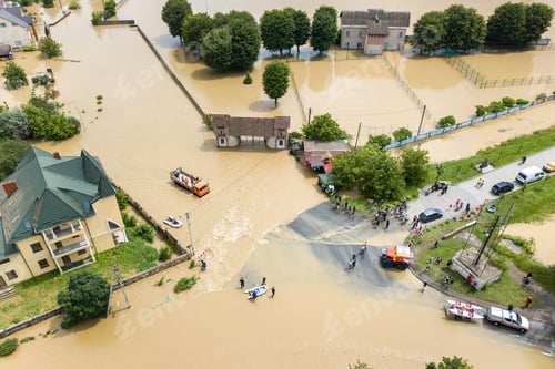 Preview: Aerial view of flooded houses and rescue vehicles saving people in Halych town, western Ukraine.
