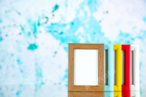 Preview: front view different picture frames with colored corners on the light blue background color picture