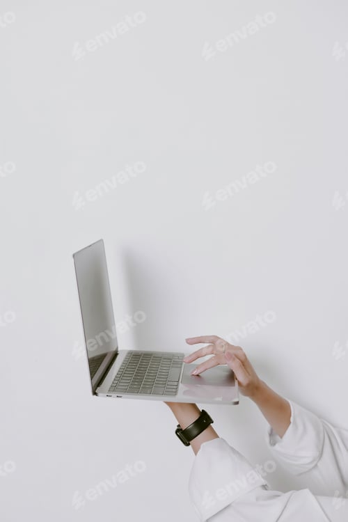 Preview: Woman hand working with laptop