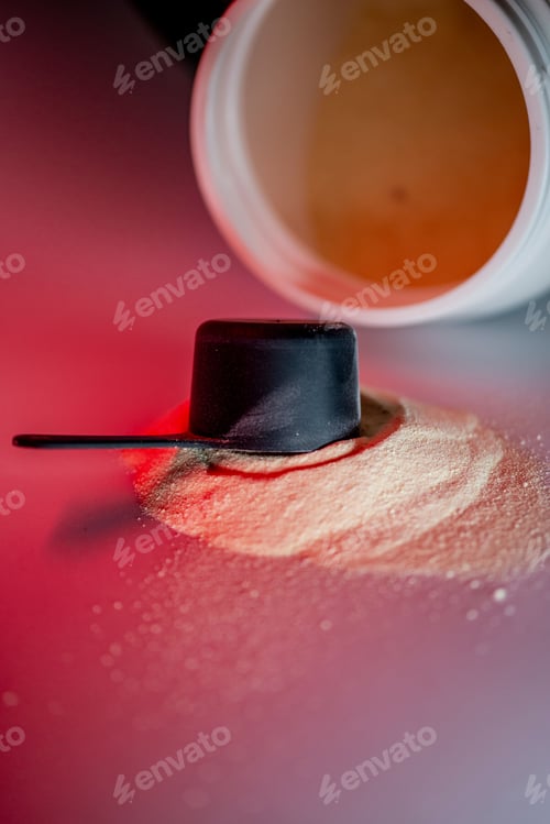 Preview: Black scoop with protein powder and red lighting.