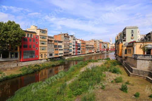 Preview: Colorful houses and Eiffel bridge and river Onyar in Girona