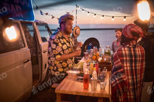 Preview: Man preparing cocktails for people