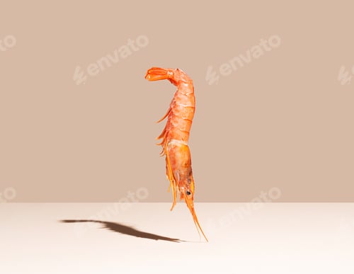 Vista previa: Red shrimp on beige background. Minimalistic concept