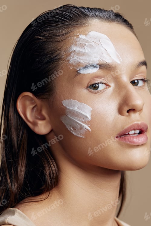 Preview: woman hand near face cream rejuvenation charm close-up make-up