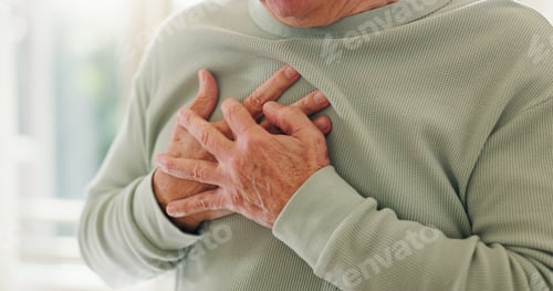 Preview: Heart, cardiology and person hands on chest with pain, sick and cardiovascular healthcare closeup.