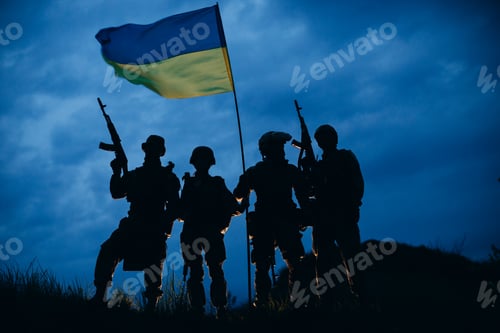 Preview: A group of armed Ukrainian warriors with a national flag in the evening
