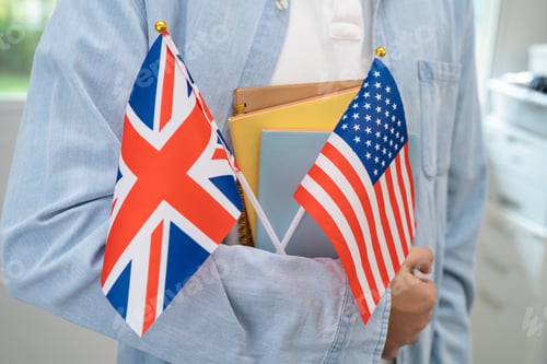 Preview: Learn English language, Asian teenage student hold book with flag in course at school.