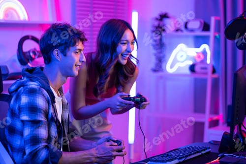 Preview: Caucasian team of e-sport gamer playing online video game on computer.