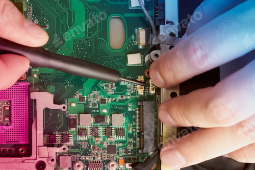 Preview: Man repairs computer
