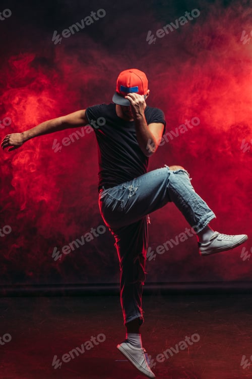 Preview: Man dancing street dance isolated in studio