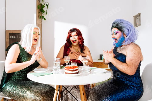 Preview: Joyful drag queen friends celebrating birthday at home