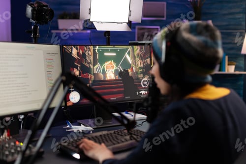 Preview: Woman live streaming video games on monitor with chat