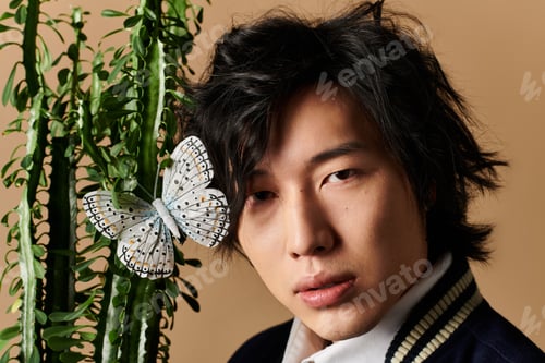 Preview: Spring fashion inspiration featuring a stylish asian man in a cozy studio setting