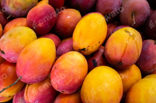 Preview: Stacks Of Mango Fruits In Vivid Red Color At Traditional Marketplace, Taiwan