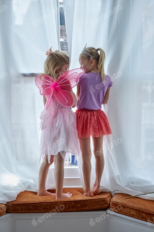 Preview: Girls in costume at bay window