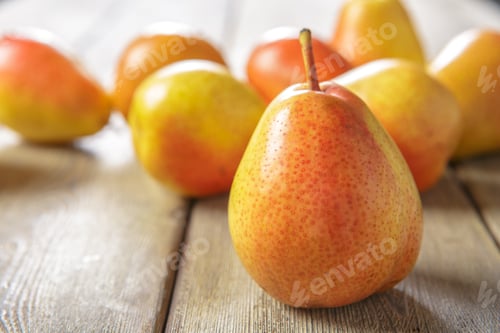 Preview: Ripe pears on rustic wooden table