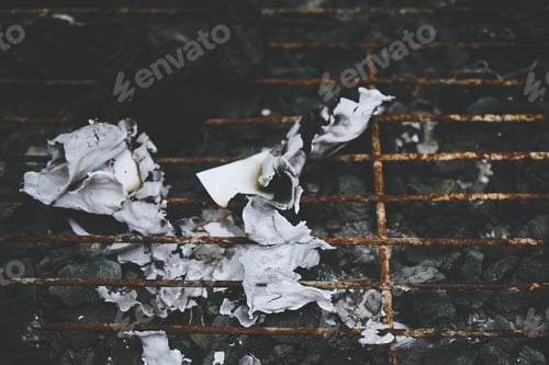 Preview: Dark and organic background of remains of burn paper
