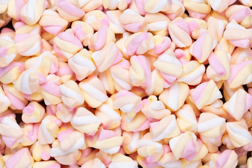 Preview: Colorful marshmallows background with copy space.