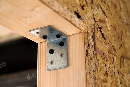 Preview: Close up detail of house construction wooden wall elements. Interior frame renovation work