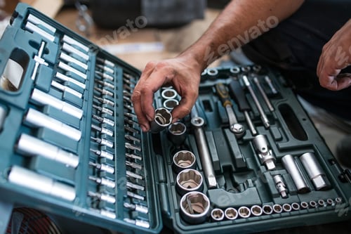 Preview: Mechanic tidying up tools