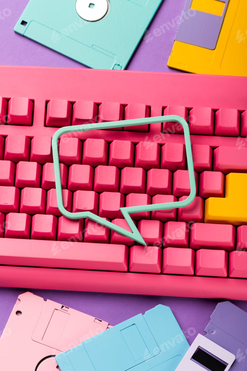 Preview: Floppy disks and keyboard on bright colored backgrounds.